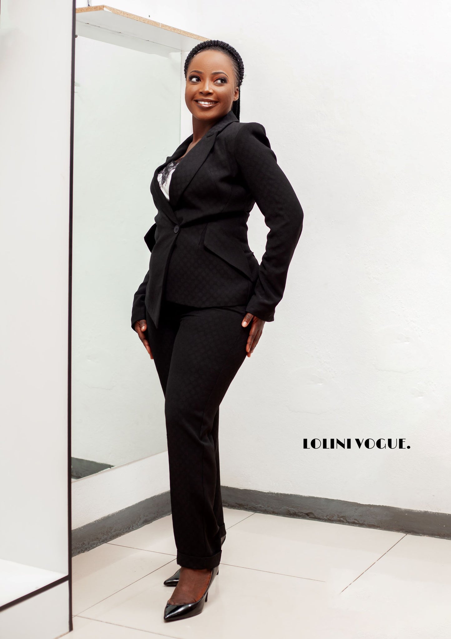 Black pant suit with cigarette pants and tailor fitted jacket