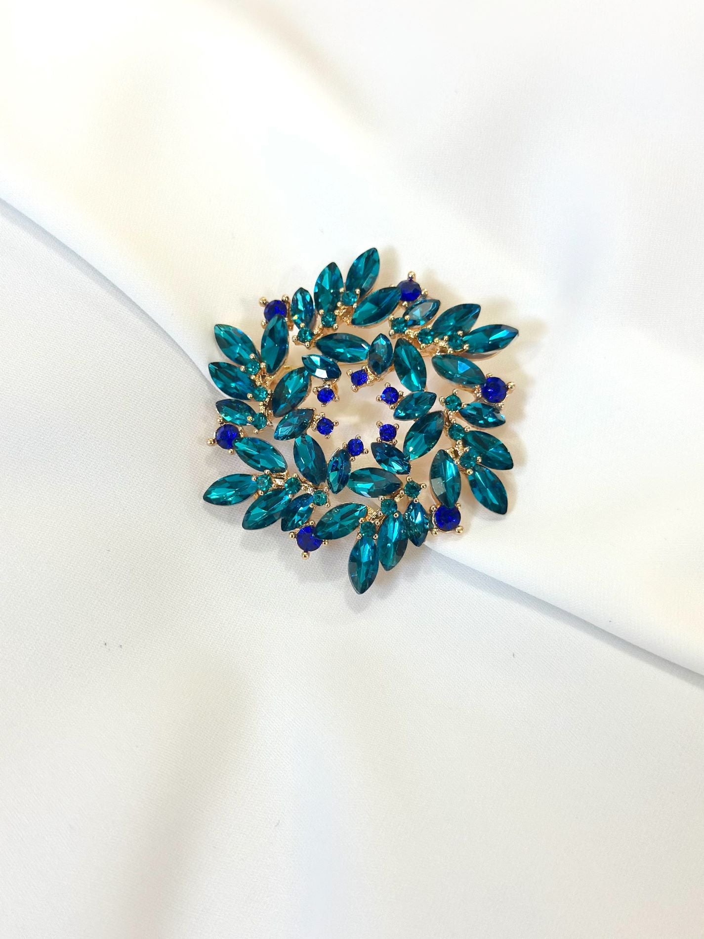 blue brooch-lolini vogue