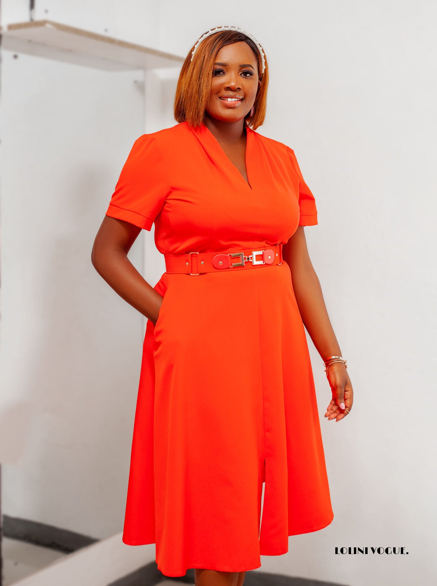 coral belted flared dress with side pockets and  front slit