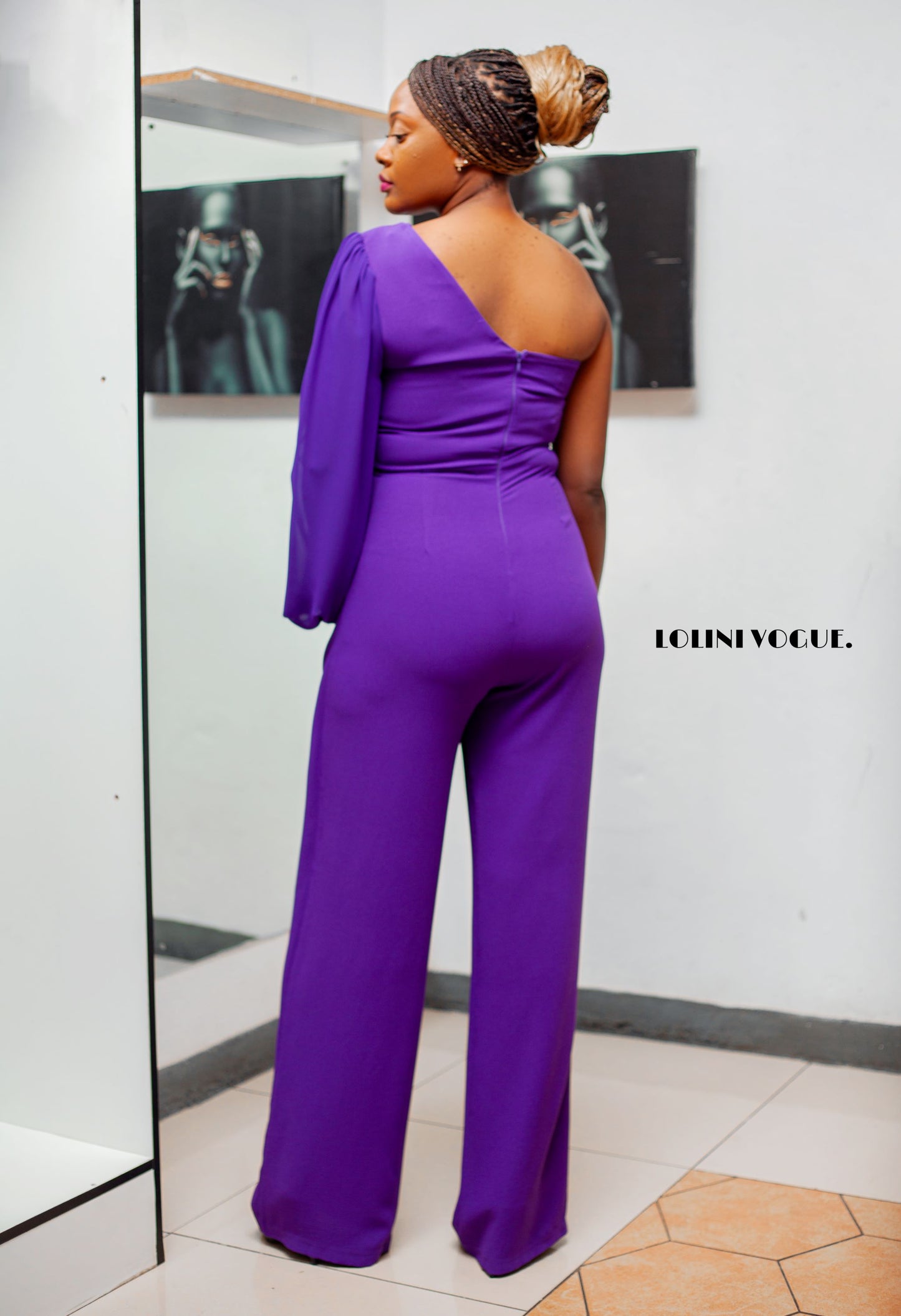 purple jumpsuit with one hand sleeve and half skirt lapel and palazzo pant bottom