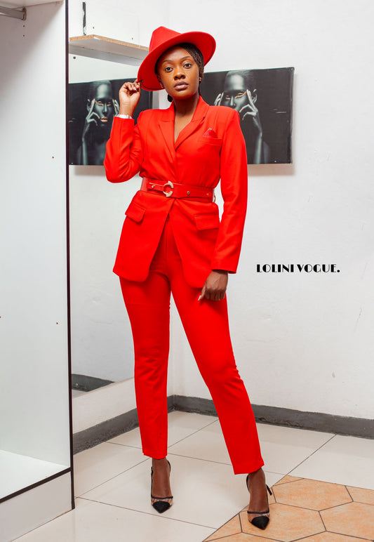 red ankle length pant suit with tailor fitted jacket that comes with a belt